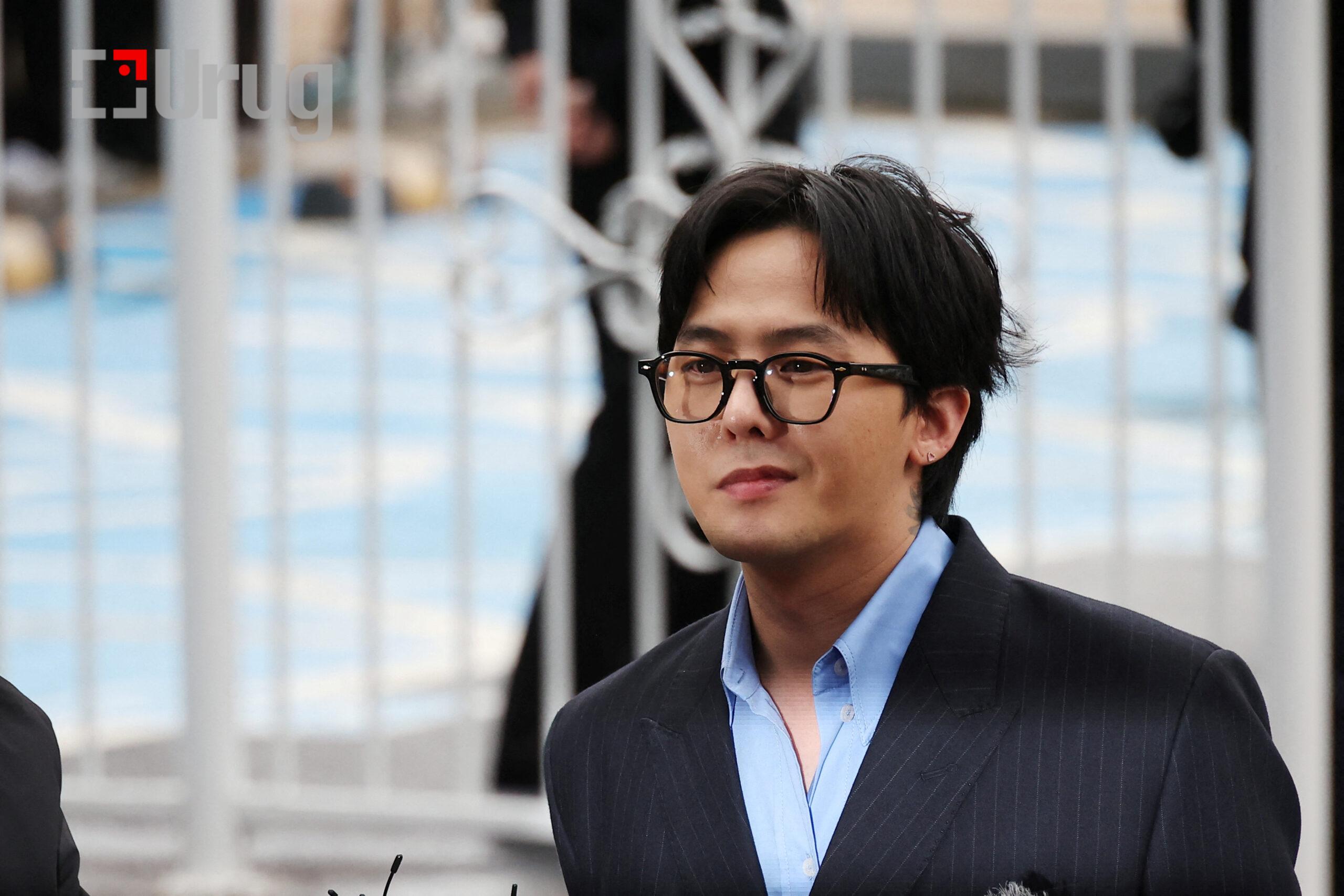 G-dragon of K-pop group BIGBANG arrives at a police station for questioning regarding his alleged illegal drug use in Incheon