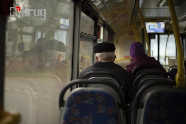 people-on-bus-seating-on-public-transport-seats-in-interior-of-bus-passengers-in-transport-photo