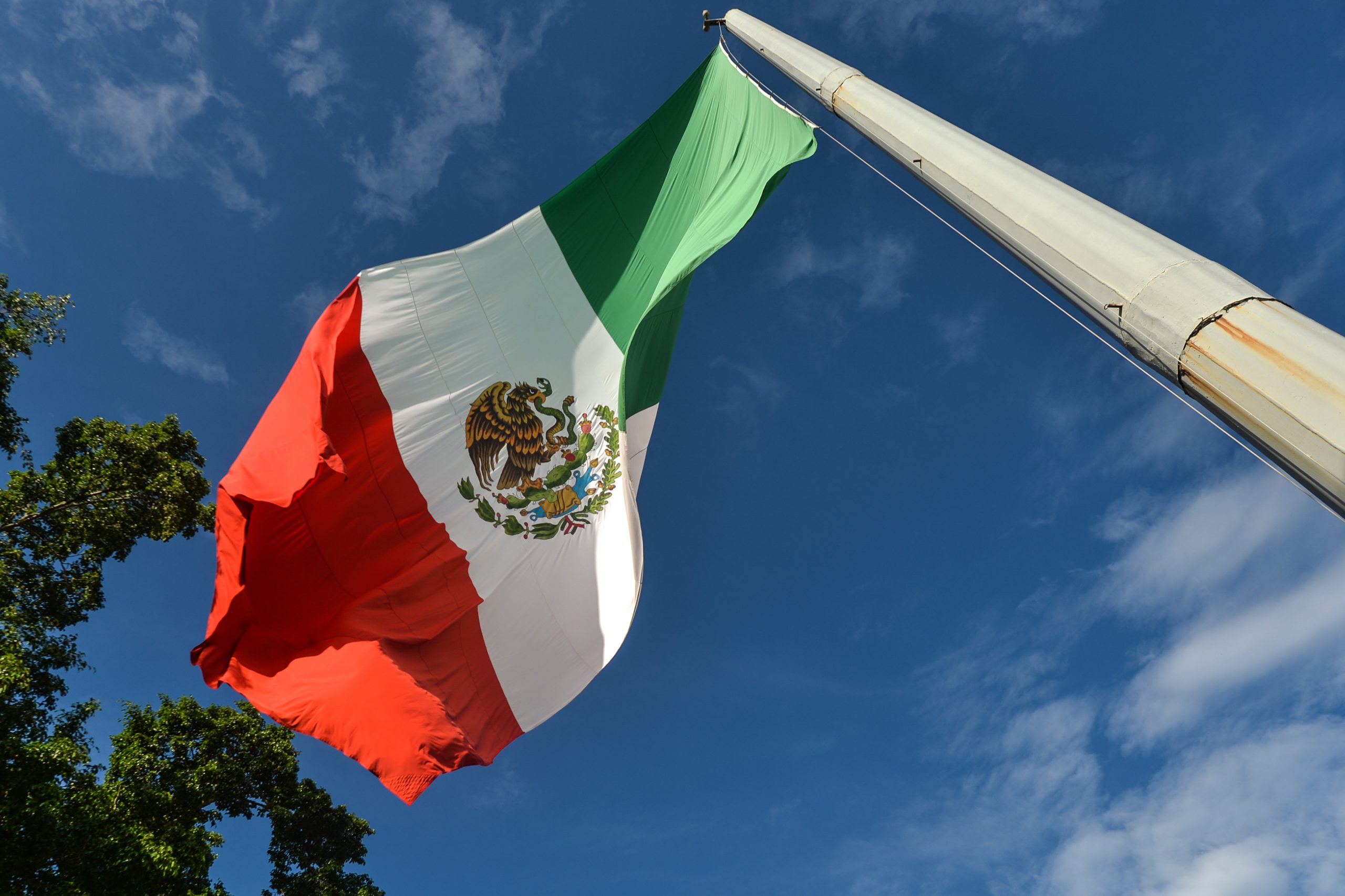The national flag of Mexico flying during the short ceremony of El Día de la Revolucion (Revolution Day), a national holiday commemorating the beginning of the Mexican Revolution on November 20, 1910.
Official Revolution Day celebrations have been canceled due to the Covid-19 pandemic.
The city of Valladolid was the site of the 'first spark of the Mexican Revolution,' also known as the Dzelkoop Plan, an uprising that began on June 4, 1910, by Maximiliano R. Bonilla and other leaders of the Independent Electoral Center and the Anti Reelectionist Front, against the dictatorship of President Porfirio Díaz.
On Saturday, November 20, 2021, in Valladolid, Yucatan, Mexico. (Photo by Artur Widak/NurPhoto via Getty Images)